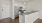 a kitchen with white cabinets