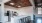 a kitchen with stools and a bar stool
