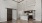a kitchen with white cabinets